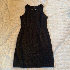 Old Navy size medium midi sleeveless black dress with gold zipper in back.